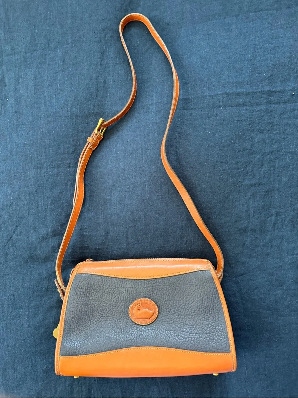 Dooney & Bourke Navy and Tan Pebbled Leather Crossbody